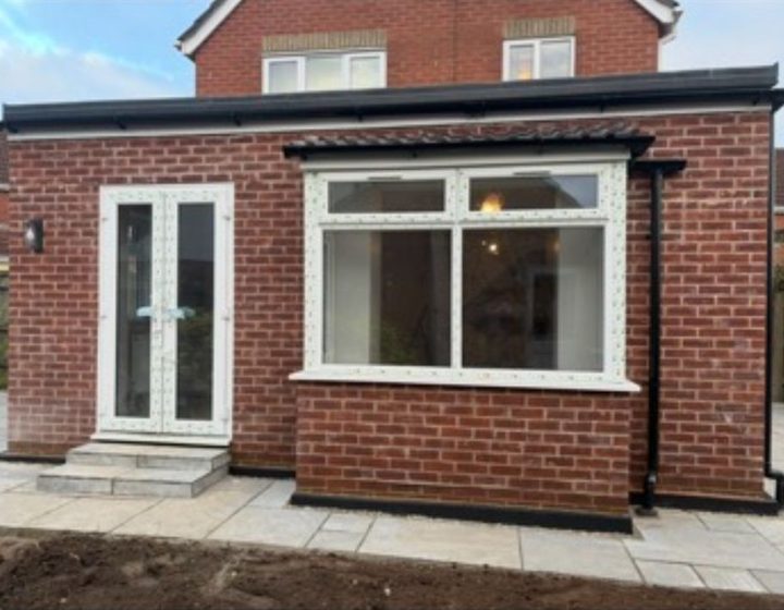 New brick extension with glazed patio doors
