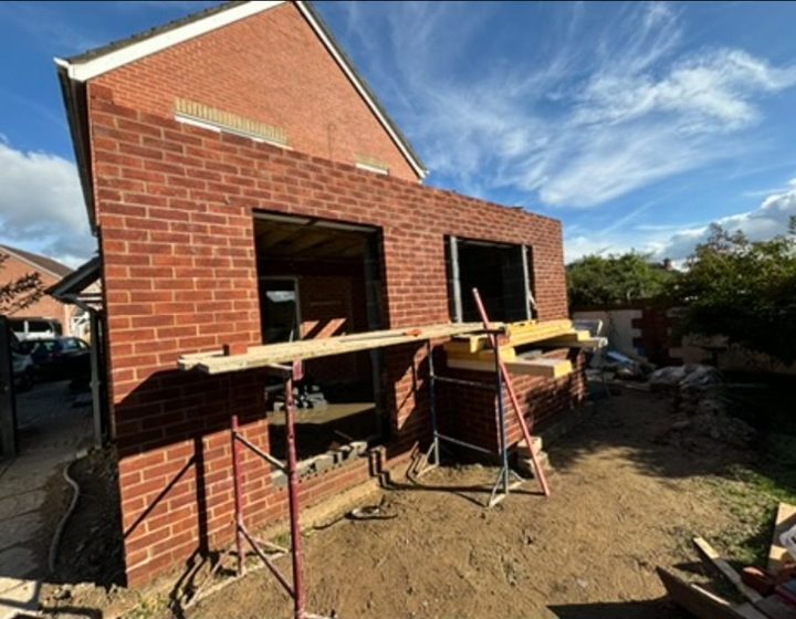 Brick extension shell during construction