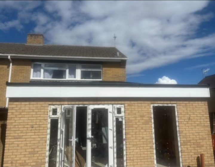 Rear house extension with wide glazing