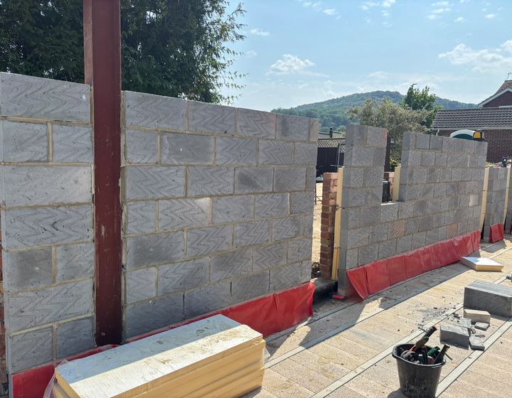 Blockwork extension walls around structural steelwork